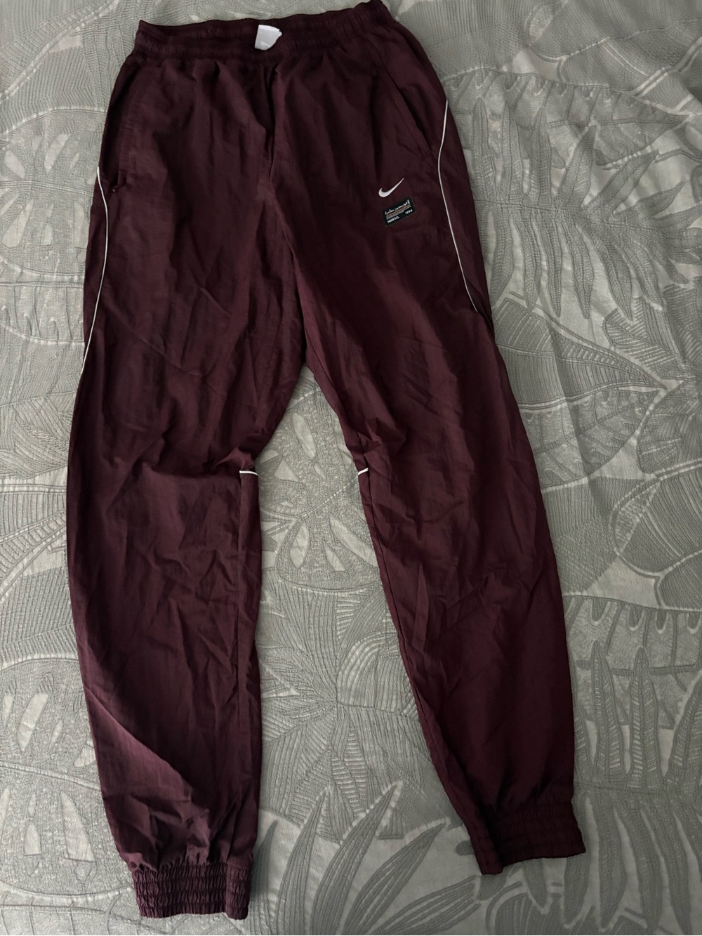 Nike Burgundy Athletic Pants with White Tag